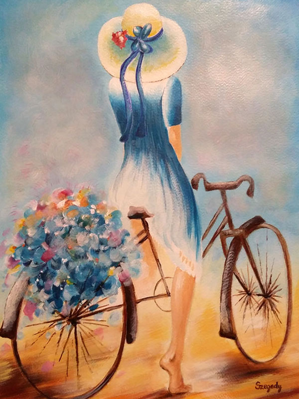 Lány virágos biciklin